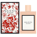 Gucci Bloom perfume bottle and packaging with floral design